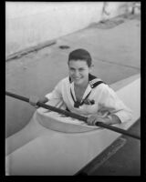 High School student Mary McCrea sits in a kayak she made, Fullerton, 1935