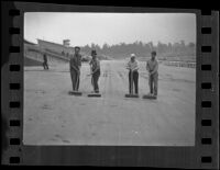Workers sweep race track at Santa Anita Park, Arcadia, ca. 1934