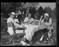 Mrs. George J. Hill, Sr., Mrs. George J. Hill, Jr. and Mrs. Frederick F. Payne enjoy a luncheon at the Desert Inn, Palm Springs, 1935