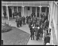 Marines and government officials mingle in the courtyard of the Hotel del Coronado, Coronado, 1935