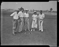 Grantland Rice, Paul Gallico, J. Westbrook Pegler, Babe Didrikson, and Braven Dyer, playing golf, Brentwood, 1933