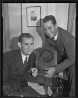 Loamon Phillips and Shelley Burt play with the radio, Pasadena, 1935