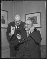 Potentates Leonard P. Steuart and Hugh M. Caldwell in a Biltmore hotel suite, Los Angeles, 1936