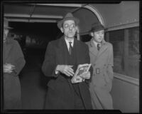 Charles A. Niedman arrives in search for missing daughter, followed by reporter Marvin Miles, Los Angeles, 1936