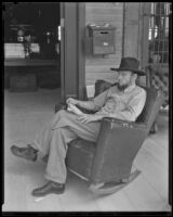 Man in a rocking chair at the Pony Express Museum, Arcadia, 1930s