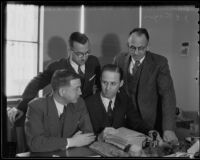 Ben Rosenthal, Claude Minard, William Moseley Jones, and J.E. Frazier assess oil, Los Angeles, 1936