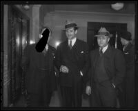 Actor Duncan Renaldo, his attorney Howard B. Henshey and Sheriff L. F. Thomas, Los Angeles, 1936