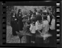Two Nuns and a group of children at Mission San Juan Capistrano, San Juan Capistrano, 1936