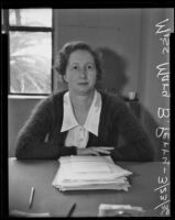 State director of National Youth Administration educational camps Mary B. Perry chooses from female applicants, San Bernardino, 1936