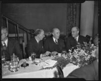 Dr. Max Farrand, Dr. David C. MacWatters, and Attorney Ed Lyman have a discussion over a meal, Los Angeles, 1936