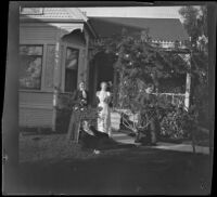 Bendixon family poses in front of their house, Los Angeles, about 1900
