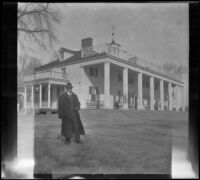 H. H. West with George Washington's Mount Vernon Estate behind him, Mount Vernon, 1917