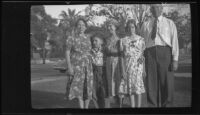Mertie West poses with the Siemsen family, Los Angeles, 1939