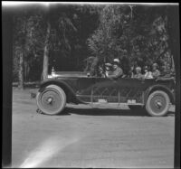 Forrest Whitaker, Abraham Whitaker, Agnes Whitaker, H. H. West Jr., and Mertie West sit in a Willys-Knight car, Yosemite National Park, about 1929