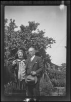 H. H. West and Mertie West in the back yard of the house at 2223 Griffin Ave., Los Angeles, 1932