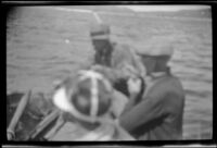 Forrest Whitaker and H. H. West, Jr. fishing in a boat on Grant Lake, Mono County vicinity, 1929