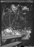H. H. West's extended family eats a picnic lunch in Victory Park, Los Angeles, 1931