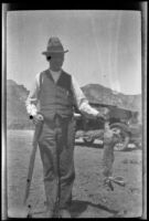 Clarence Cline holding a rabbit that he shot, Nevada, 1923