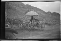 Woman and child in a horse-drawn wagon, Las Vegas (vicinity), 1923