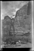 Load of lumber being transported up with a cable draw works near Weeping Spring in Zion National Park, 1923