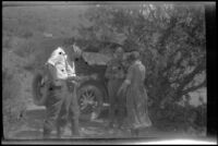 H. H. West vacation group out of the car for a stretch during a trip to Utah, 1923