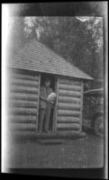 Wilfrid Cline in the doorway of a cabin at Rust's Camp near Bright Angel Point in Grand Canyon National Park, 1923