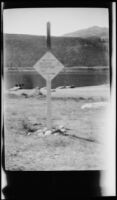 Diamond-shaped sign by a lake, Bridgeport vicinity, 1929
