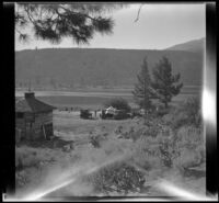 View of Twin Lakes including an ice house and cars, Bridgeport vicinity, 1929