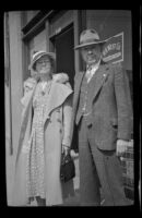 H. H. West and Helen Goforth stand in front of West's office on Towne Avenue, Los Angeles, 1939