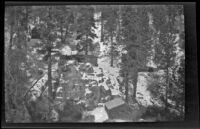 Wells cabin and surrounding landscape, as seen from a hillside in winter, Big Bear, 1932