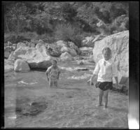 Frances Cline and Frances West, wading in Big Tujunga Creek, Sunland-Tujunga vicinity, 1912