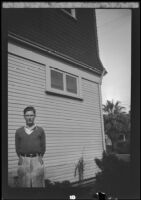 Man stands next to the West's house at 2223 Griffin Avenue, Los Angeles, about 1932