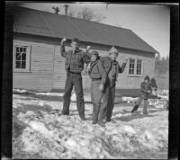 Frank Willis, Dudley Nichols and H. H. West, Jr. throwing snowballs at Big Pines Boy Scout Camp, Big Pines vicinity, 1934