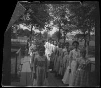 School girls line up outside of the school where H. H. West's cousin, Nella Bydolf, was a teacher, Burlington, 1900