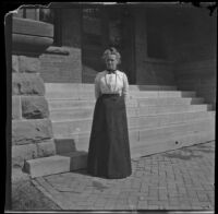 Nella Brydolf stands in front of the school where she was a teacher, Burlington, 1900
