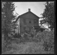 Lemberger home surrounded by trees and brush, Burlington, 1900