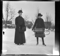 Louise Lemberger and Marie Lemberger stand in the snow, Burlington, 1917