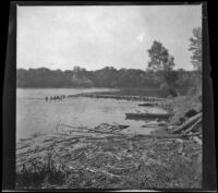 Island in the Mississippi River with a boat at the shore, Burlington, 1900
