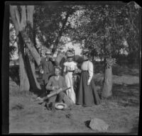 H. H. West along with his mother and cousins pose on an island in the Mississippi River, Burlington, 1900