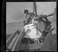 H. H. West, Daisy Conner, and Bruce Mussey on a boat, Santa Catalina Island vicinity, about 1901