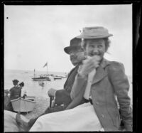 Daisy Conner sits next to George M. West, Santa Catalina Island, about 1901