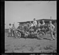 Members of the Cazadores Gun Club pose for a photograph after a shoot, Orange County vicinity, October 1, 1909