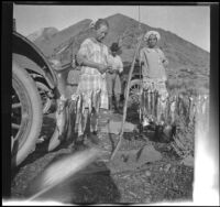 Frances West, Elizabeth West and Ted McClellan hang about the group's campsite, Mammoth Lakes vicinity, 1915