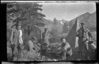 Members of the West, Schmitz and Scullin camping party gathered around their campsite near Convict Lake, Mammoth Lakes vicinity, 1918