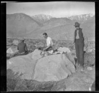 Wilfrid Cline, Glen Velzy and Chas Stavnow eating at their campsite, Lone Pines vicinity, 1918