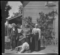 H. H. West's family poses in front of John Lemberger's house, Crafton, 1901