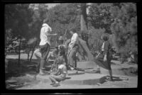 Boys and girls gather around the camp pump, Lake Arrowhead vicinity, 1938