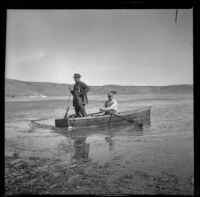 Harry Becker and Jesse Shanklin in a boat on Crane Lake, Gorman vicinity, circa 1910s