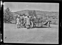 The West, Stavnow and Velzy party pose by their car near Dove Springs, Kern County, about 1915