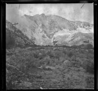 A snow-covered mountain near Scotty's Springs and Division Creek, Independence vicinity, 1916